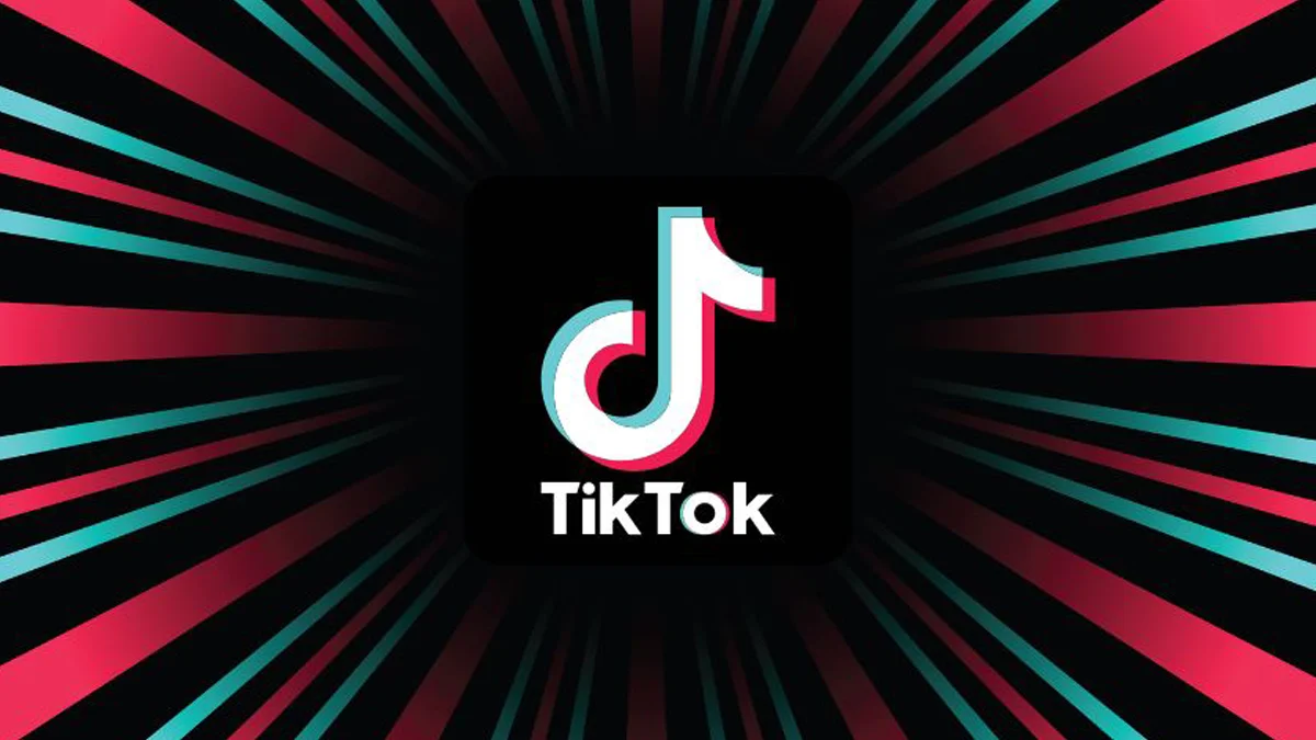 TikTok headquarters with a digital screen displaying advertising trends amid leadership restructuring.